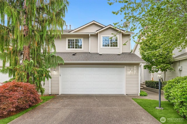17515 110th Ln SE Unit 27, Renton, WA 98055 - view of front facade featuring asphalt driveway, an attached garage, and a shingled roof