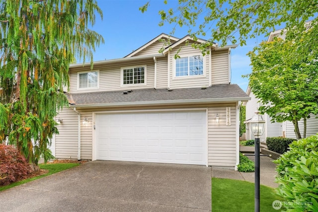 17515 110th Ln SE Unit 27, Renton, WA 98055 - view of front facade with driveway and an attached garage