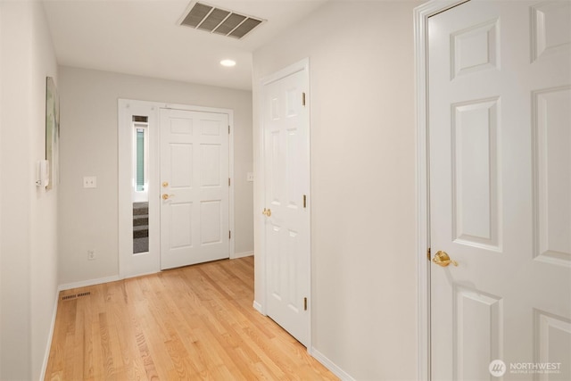17515 110th Ln SE Unit 27, Renton, WA 98055 - foyer entrance with light wood finished floors and recessed lighting