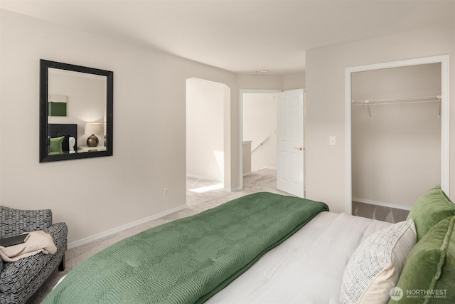17515 110th Ln SE Unit 27, Renton, WA 98055 - carpeted bedroom with a closet and baseboards