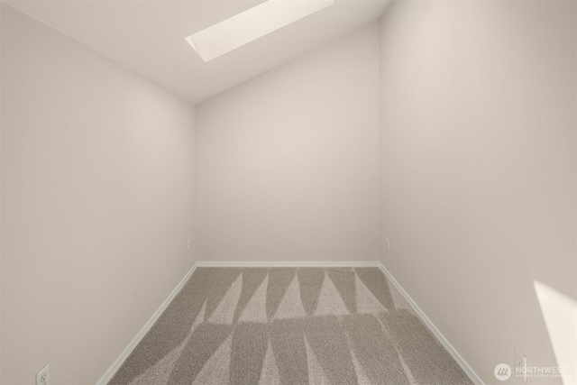 17515 110th Ln SE Unit 27, Renton, WA 98055 - carpeted spare room featuring a skylight and vaulted ceiling