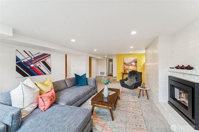 2626 W Lynn St, Seattle, WA 98199 - living room featuring recessed lighting and a brick fireplace