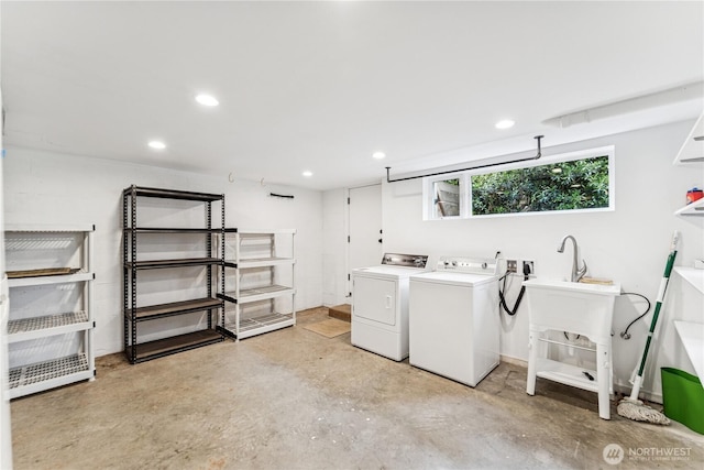 2626 W Lynn St, Seattle, WA 98199 - laundry area featuring washer and clothes dryer and recessed lighting