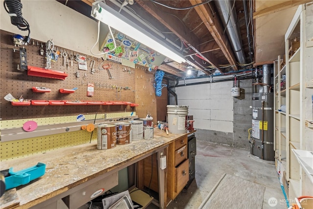 2626 W Lynn St, Seattle, WA 98199 - unfinished below grade area featuring strapped water heater and a workshop area