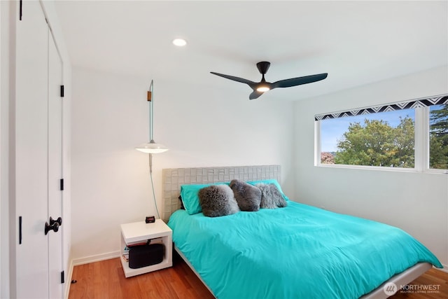 2626 W Lynn St, Seattle, WA 98199 - bedroom with wood finished floors, recessed lighting, and ceiling fan