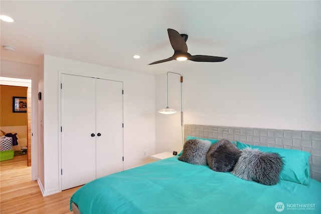 2626 W Lynn St, Seattle, WA 98199 - bedroom featuring light wood-style flooring, a closet, recessed lighting, and a ceiling fan