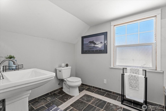 7012 S Warner St, Tacoma, WA 98409 - half bathroom with lofted ceiling and toilet