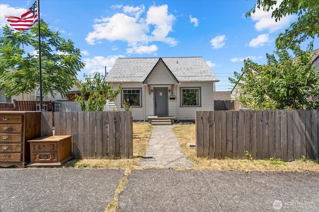 7012 S Warner St, Tacoma, WA 98409 - bungalow-style home with a shingled roof