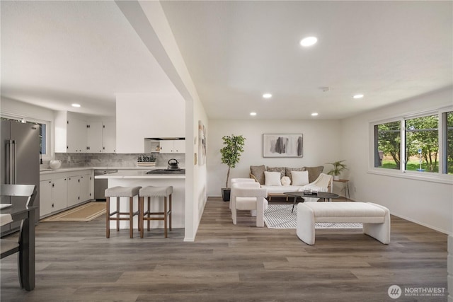 1626 127th Ave NE, Lake Stevens, WA 98258 - living room featuring recessed lighting and wood finished floors