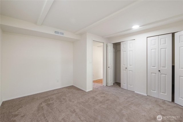 1626 127th Ave NE, Lake Stevens, WA 98258 - unfurnished bedroom featuring carpet floors and multiple closets