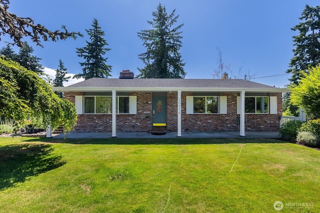 10414 43rd Street Ct E, Edgewood, WA 98372 - ranch-style house featuring a front yard, brick siding, and a chimney