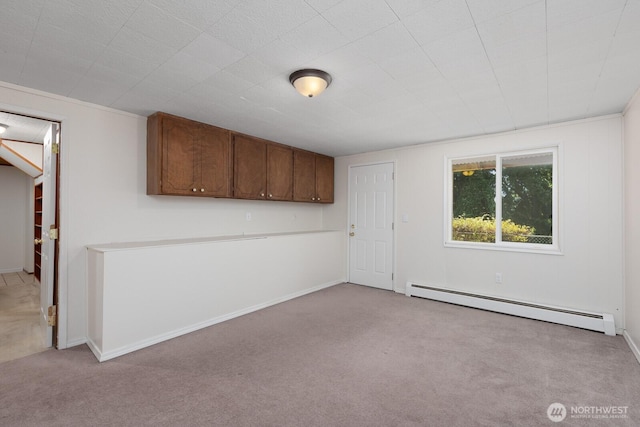 10414 43rd Street Ct E, Edgewood, WA 98372 - empty room with a baseboard heating unit and carpet