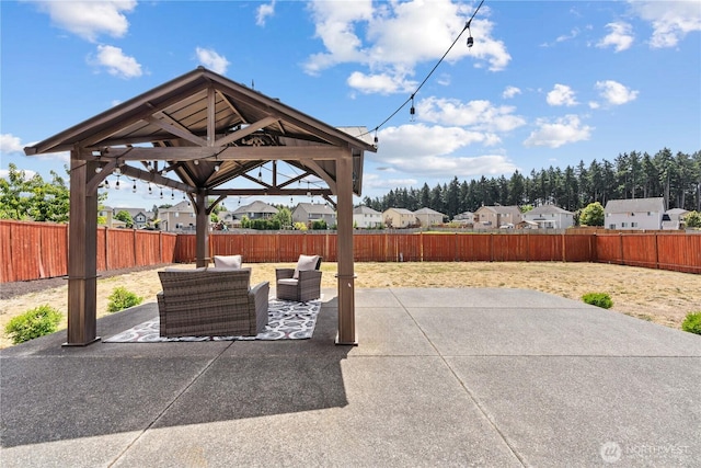 22817 80th Avenue Ct E, Graham, WA 98338 - fenced backyard featuring a patio, a gazebo, an outdoor hangout area, and a residential view