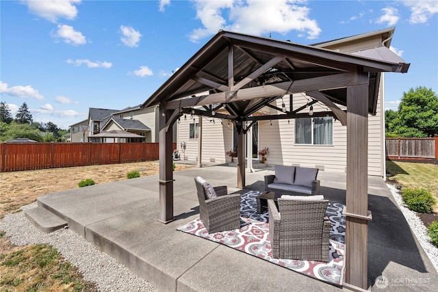 22817 80th Avenue Ct E, Graham, WA 98338 - fenced backyard featuring an outdoor hangout area, a gazebo, and a patio area