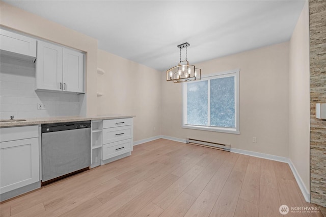 12303 Harbour Pointe Blvd Unit S104, Mukilteo, WA 98275 - kitchen with stainless steel dishwasher, a baseboard heating unit, white cabinets, and a chandelier