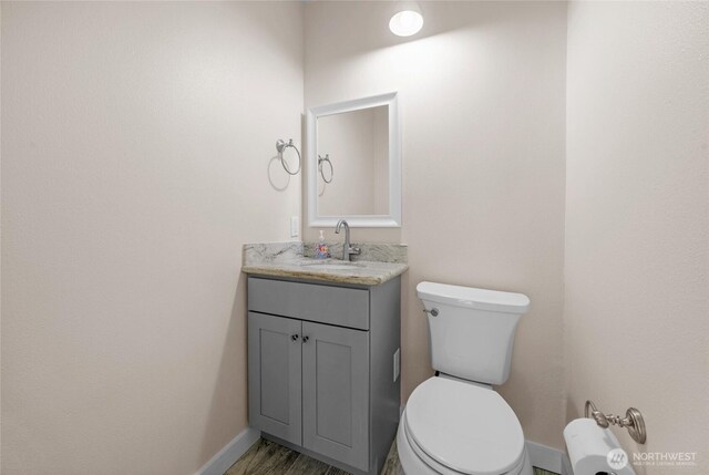 12303 Harbour Pointe Blvd Unit S104, Mukilteo, WA 98275 - bathroom featuring toilet and vanity