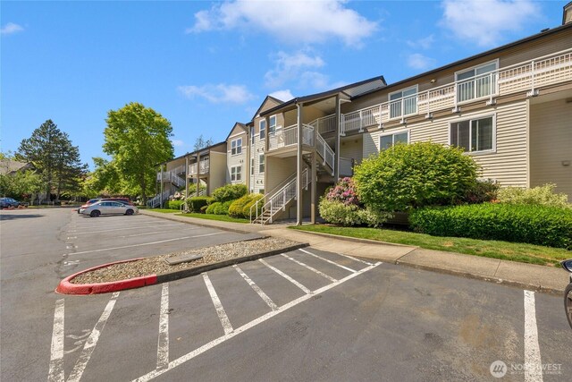 12303 Harbour Pointe Blvd Unit S104, Mukilteo, WA 98275 - uncovered parking lot featuring stairs