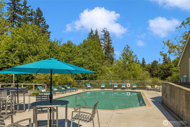 12303 Harbour Pointe Blvd Unit S104, Mukilteo, WA 98275 - community pool featuring a patio area