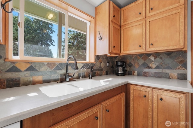2120 Seaview St W, University Place, WA 98466 - kitchen featuring decorative backsplash, plenty of natural light, light countertops, and brown cabinetry