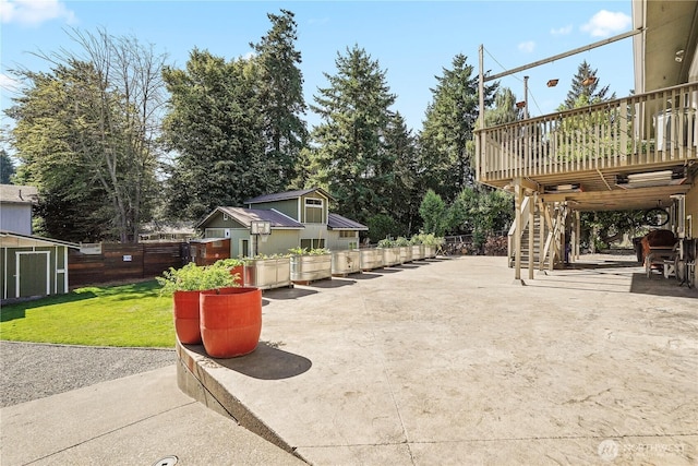 2120 Seaview St W, University Place, WA 98466 - view of patio / terrace featuring a shed, a wooden deck, and stairs