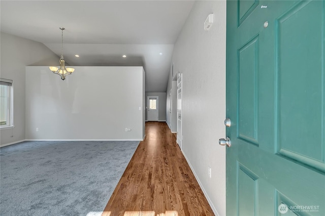 18619 16th Avenue Ct E, Spanaway, WA 98387 - foyer featuring a chandelier, healthy amount of natural light, lofted ceiling, wood finished floors, and recessed lighting