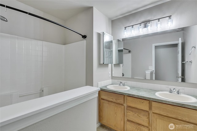 18619 16th Avenue Ct E, Spanaway, WA 98387 - full bathroom with a shower and double vanity