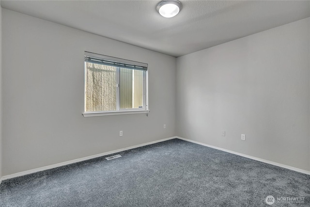 18619 16th Avenue Ct E, Spanaway, WA 98387 - spare room featuring carpet flooring and baseboards