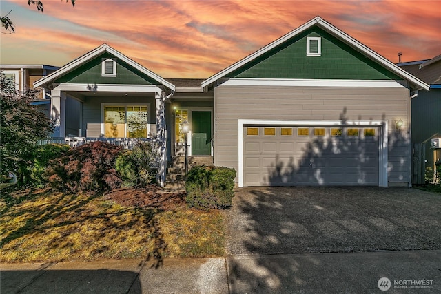 18619 16th Avenue Ct E, Spanaway, WA 98387 - ranch-style house with an attached garage, driveway, and a porch
