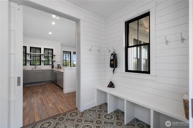 46 Seaside Ln, Pacific Beach, WA 98571 - mudroom featuring ornamental molding, wood walls, dark wood-type flooring, and recessed lighting