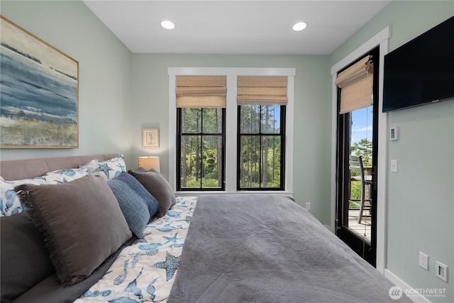 46 Seaside Ln, Pacific Beach, WA 98571 - carpeted bedroom featuring access to outside, multiple windows, and recessed lighting