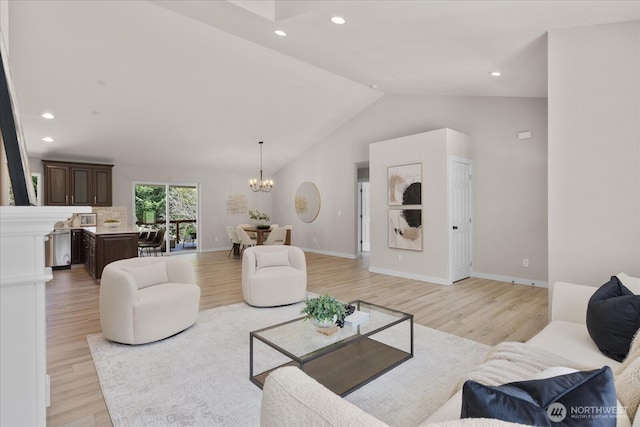 250 W Wynwood Dr, Shelton, WA 98584 - living area featuring a chandelier, light wood-style flooring, recessed lighting, and vaulted ceiling