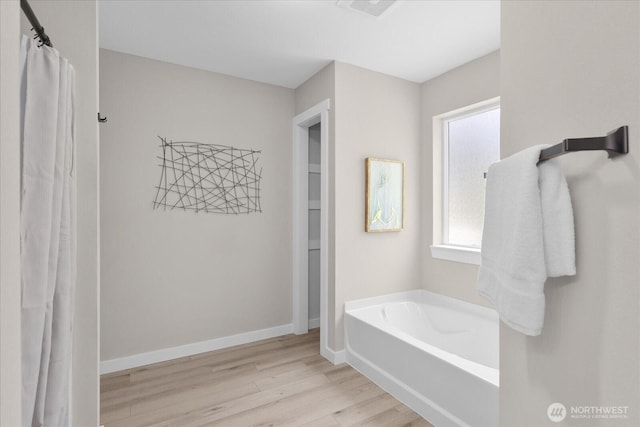 250 W Wynwood Dr, Shelton, WA 98584 - bathroom with a bath and wood finished floors