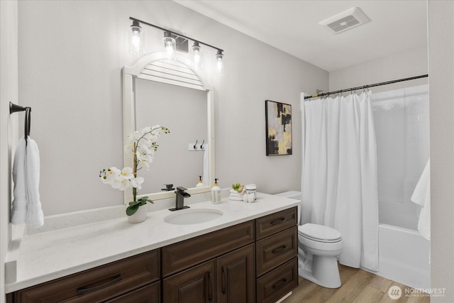 250 W Wynwood Dr, Shelton, WA 98584 - full bath with vanity, shower / bathtub combination with curtain, and wood finished floors