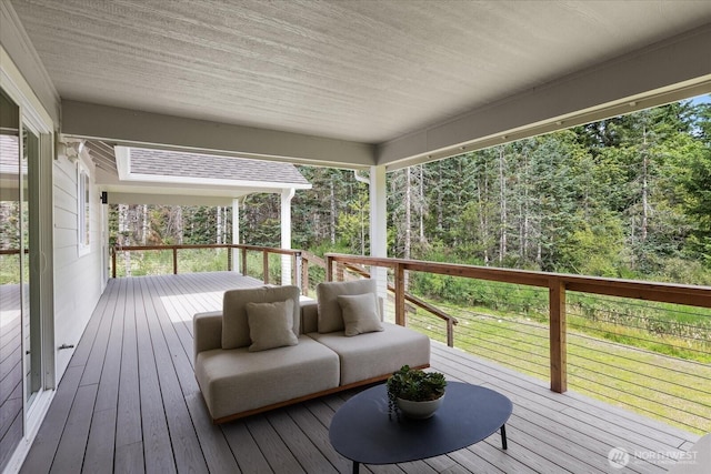250 W Wynwood Dr, Shelton, WA 98584 - wooden deck featuring a wooded view and a lawn