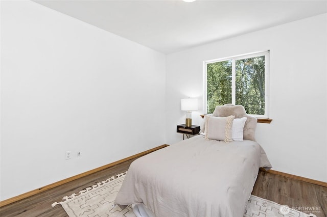 21012 82nd St E, Bonney Lake, WA 98391 - bedroom featuring wood finished floors and baseboards