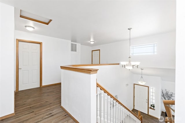 21012 82nd St E, Bonney Lake, WA 98391 - hallway with wood finished floors and an upstairs landing