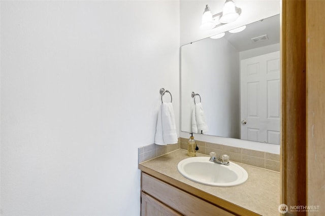 21012 82nd St E, Bonney Lake, WA 98391 - bathroom with vanity and tasteful backsplash