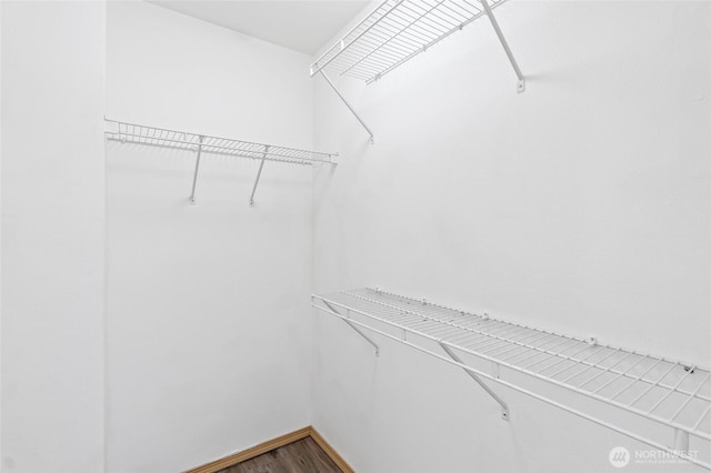 21012 82nd St E, Bonney Lake, WA 98391 - walk in closet featuring wood finished floors