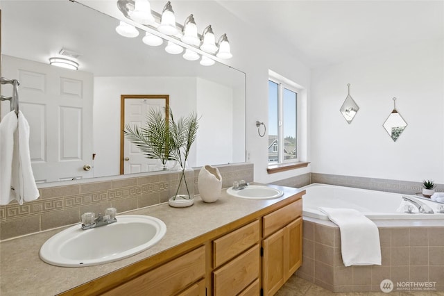 21012 82nd St E, Bonney Lake, WA 98391 - bathroom featuring double vanity, a garden tub, and tasteful backsplash