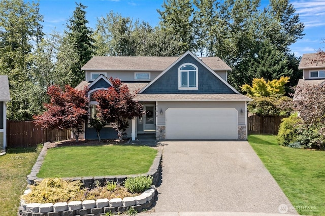 21012 82nd St E, Bonney Lake, WA 98391 - traditional-style home featuring asphalt driveway, an attached garage, stone siding, and roof with shingles