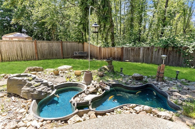 21012 82nd St E, Bonney Lake, WA 98391 - view of swimming pool featuring a fenced backyard
