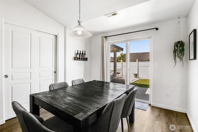 1344 E Deborah St, Moses Lake, WA 98837 - dining space featuring wood finished floors and lofted ceiling