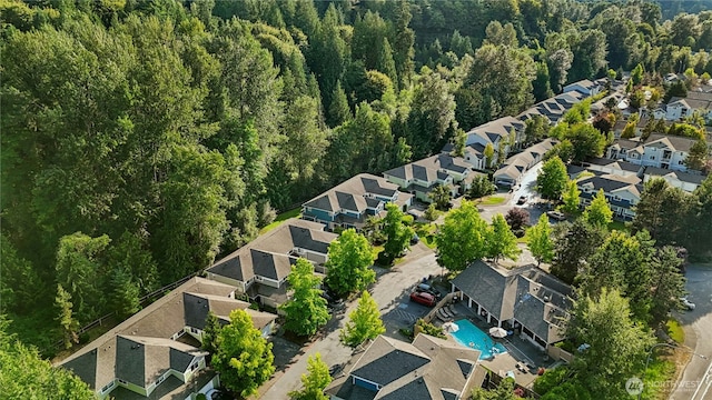 15150 140th Way SE Unit K103, Renton, WA 98058 - aerial overview of property's location with nearby suburban area and a forest