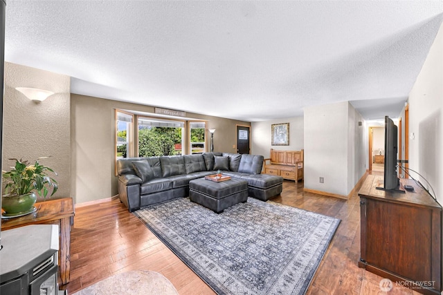 5215 Richmond Cres, Blaine, WA 98230 - living room featuring a textured ceiling, hardwood / wood-style flooring, and a textured wall
