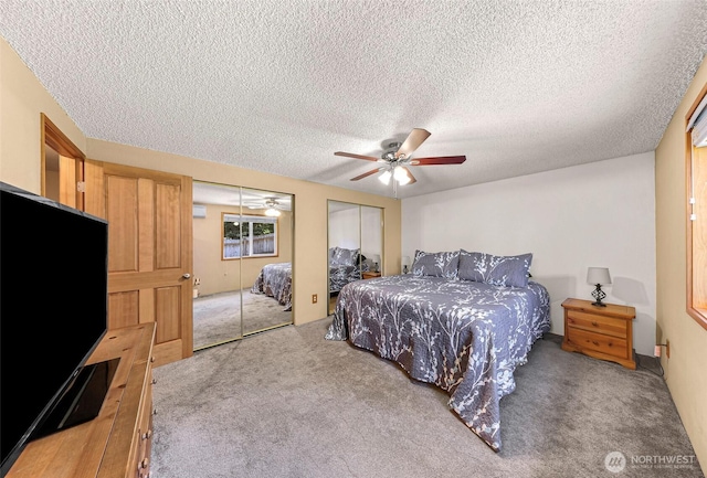 5215 Richmond Cres, Blaine, WA 98230 - bedroom with multiple closets, carpet floors, a textured ceiling, and ceiling fan