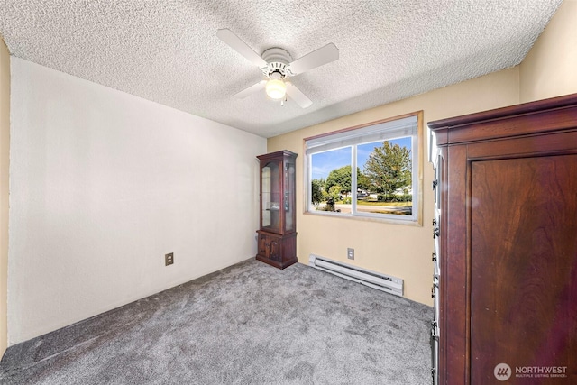 5215 Richmond Cres, Blaine, WA 98230 - carpeted empty room with a baseboard radiator, ceiling fan, and a textured ceiling