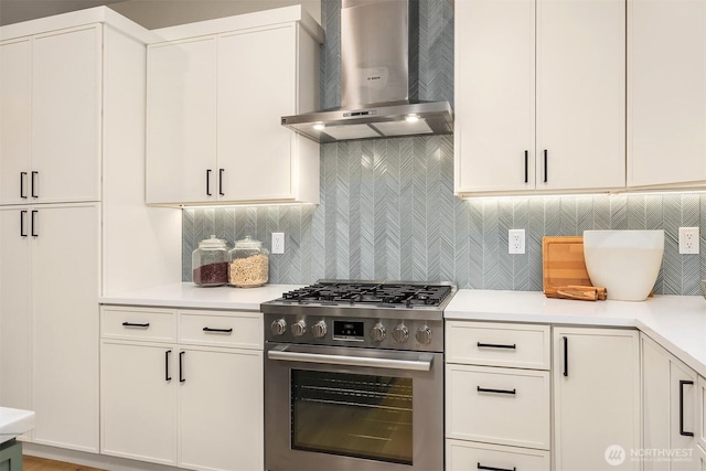10511 NE 112th St, Kirkland, WA 98033 - kitchen with stainless steel range, wall chimney exhaust hood, light countertops, and tasteful backsplash