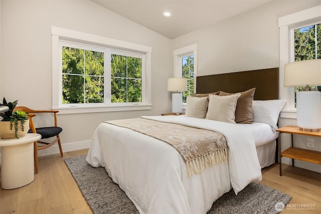 10511 NE 112th St, Kirkland, WA 98033 - bedroom with lofted ceiling, light wood finished floors, and recessed lighting