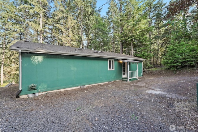 261 E Emerald Lake Dr W, Grapeview, WA 98546 - back of house featuring crawl space
