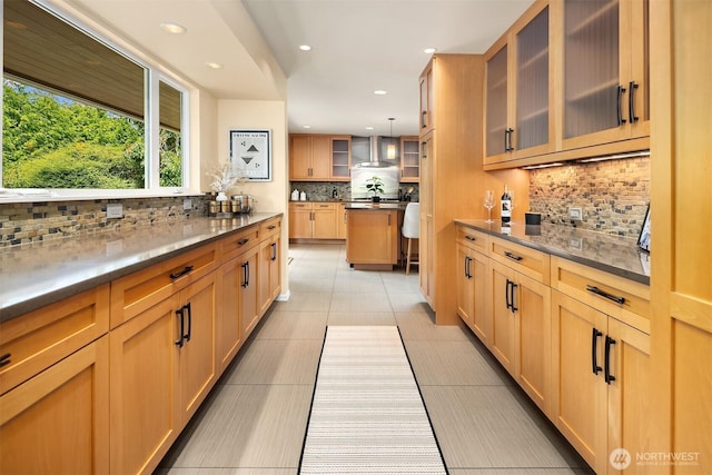 17905 3rd Ave NW, Shoreline, WA 98177 - kitchen featuring decorative backsplash, glass insert cabinets, recessed lighting, light tile patterned floors, and hanging light fixtures